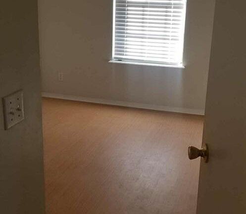 View of one bedroom.