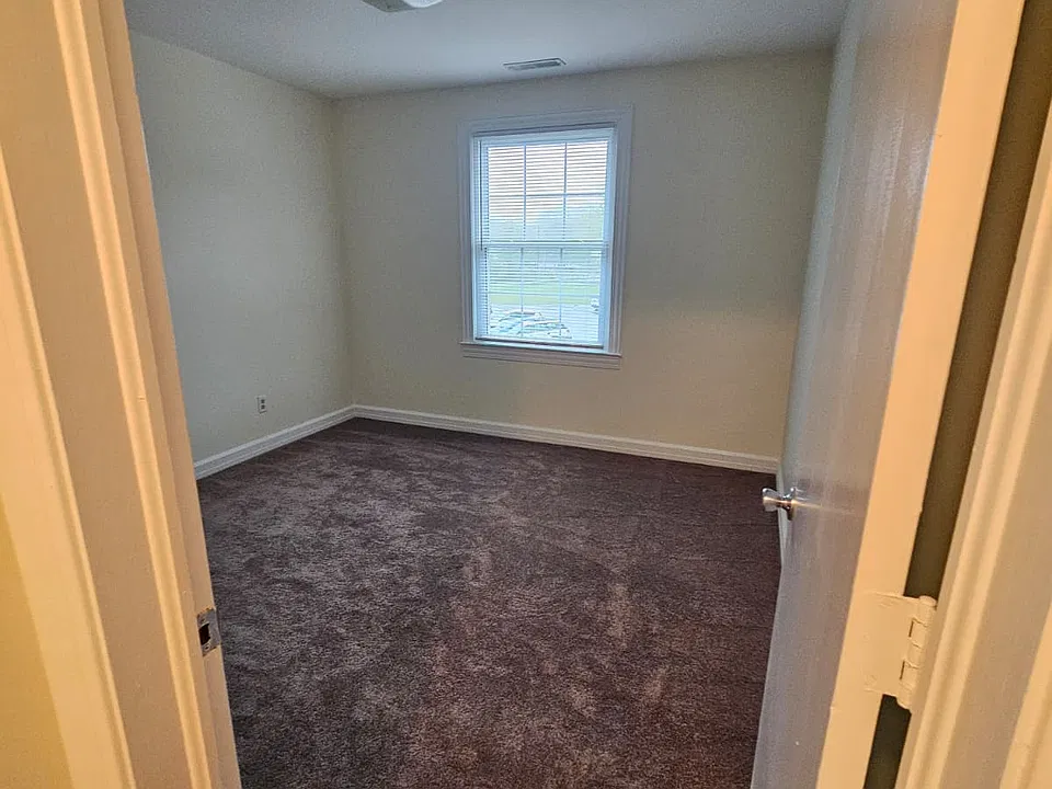 Bedroom 1 faces the parking lot.
Natural light.