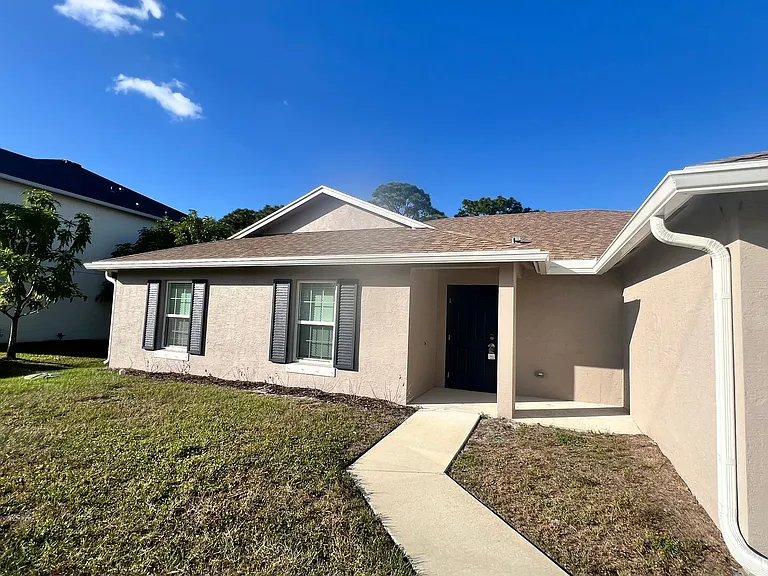 5951 NW Baynard Dr — Photo 3