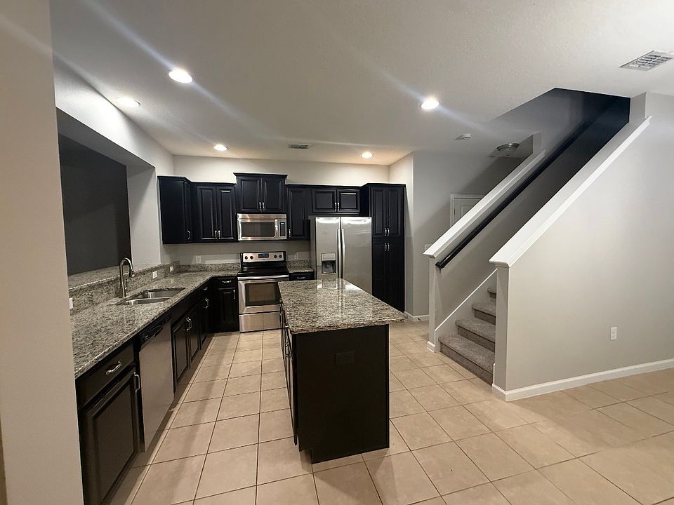 Large kitchen with an open floor plan.