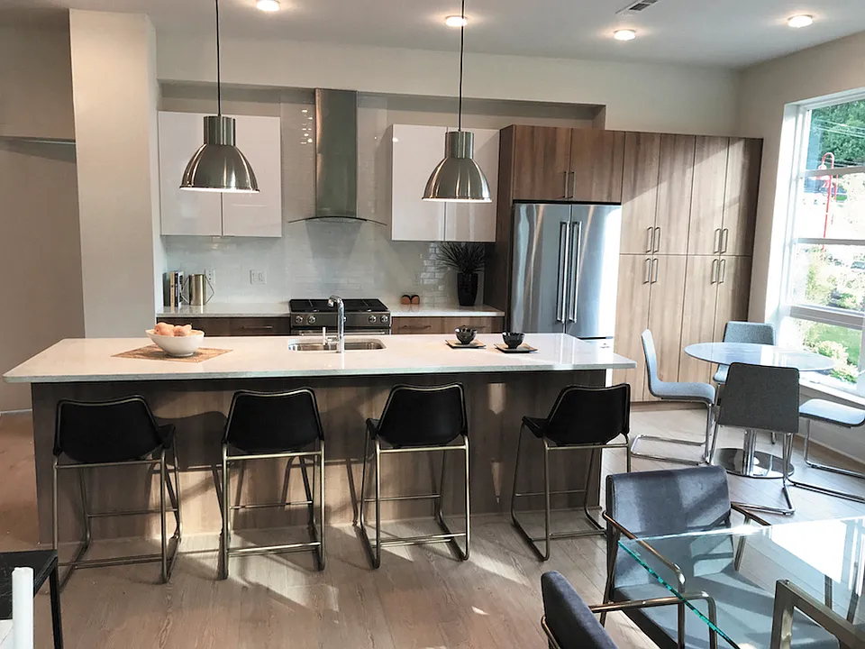 Corner Units Feature Dramatic Island Kitchens