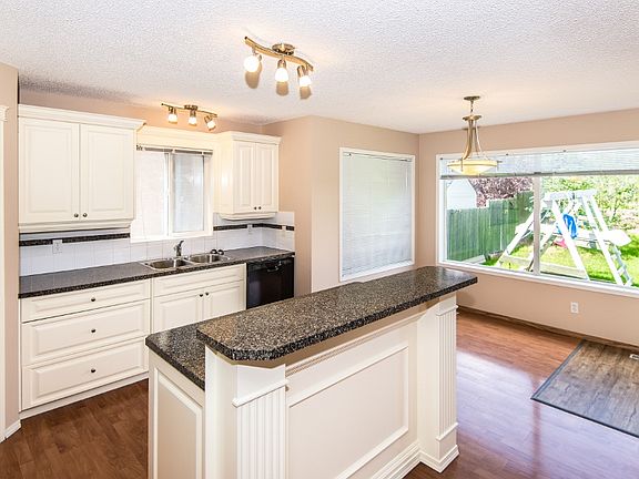 3rd image of 111 Arbour Crest Rise NW