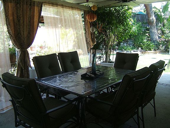 covered patio with fans 