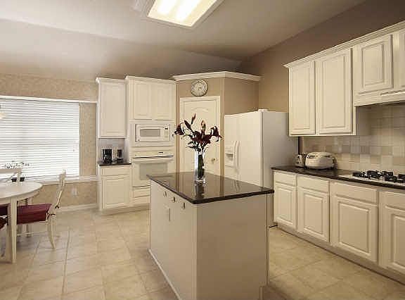 Stunning kitchen updated with granite counters and new GE appliances