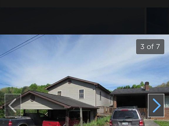 Left side of the house and two car garage 
This is a unit above the garage and is very nice inside and includes the garages