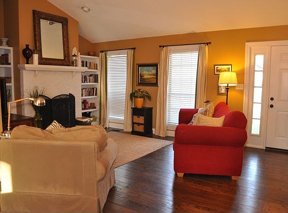 Custom built bookshelves on both sides of the fire place