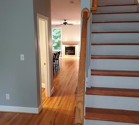Stairway, hallway dining room and half bath doorway