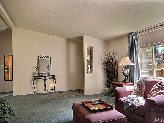 Designated entry opens to spacious living room.