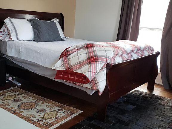 Master Bedroom with winter linens and Horsehair rug and imported Turkish rug.