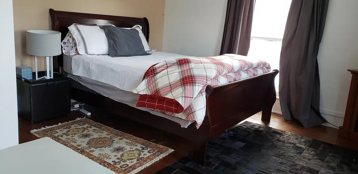 Master Bedroom with winter linens and Horsehair rug and imported Turkish rug. - 290 E 1st St #2-6