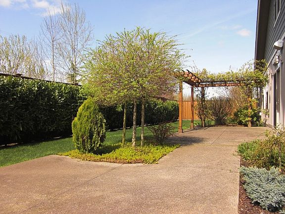 Fully fenced backyard; beautifully landscaped with sprinkler system, large patio for entertaining