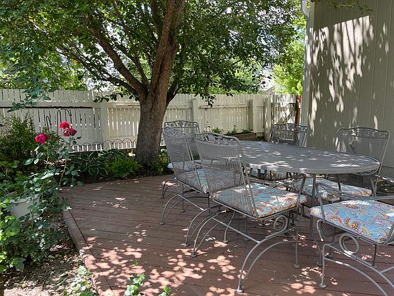 Private Courtyard with apple tree, spring bulbs and perennials