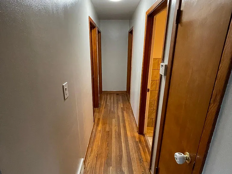 Hall way from Living room to bathroom and 3 bedrooms