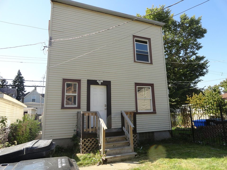 Unit is located in the rear of main property.