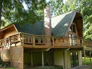 Looking back at house from corner of back yard.