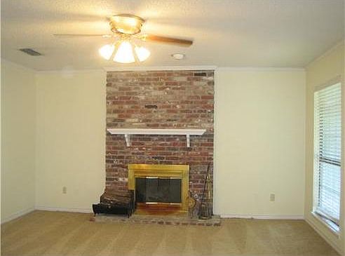 Wood Burning Fireplace in Den