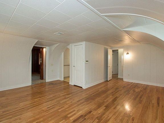 Spacious living room with hardwood floors.