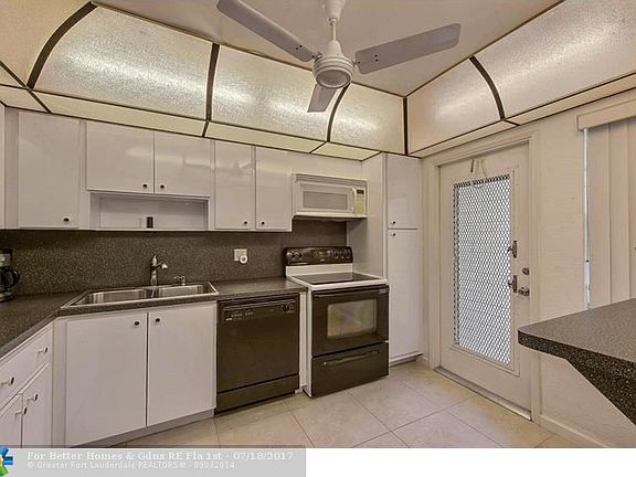 2nd image of 3351 S Palm Aire Dr APT 402