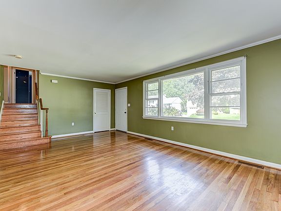 Spacious living room is awash in natural light