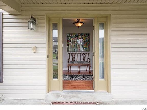 Under the wide front veranda you are greeted to enter a generous Foyer that acts as a hub to the center of this home.