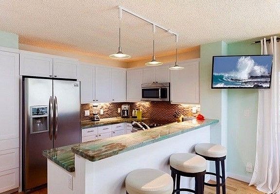 4th image of 75-6016 Alii Dr APT 220