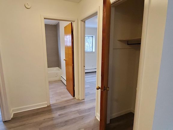 Hall closet, bedrooms and full bath
