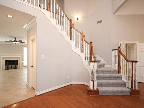 Come in and take a tour! This soaring entry includes hardwood flooring and plenty of room to great your guests.