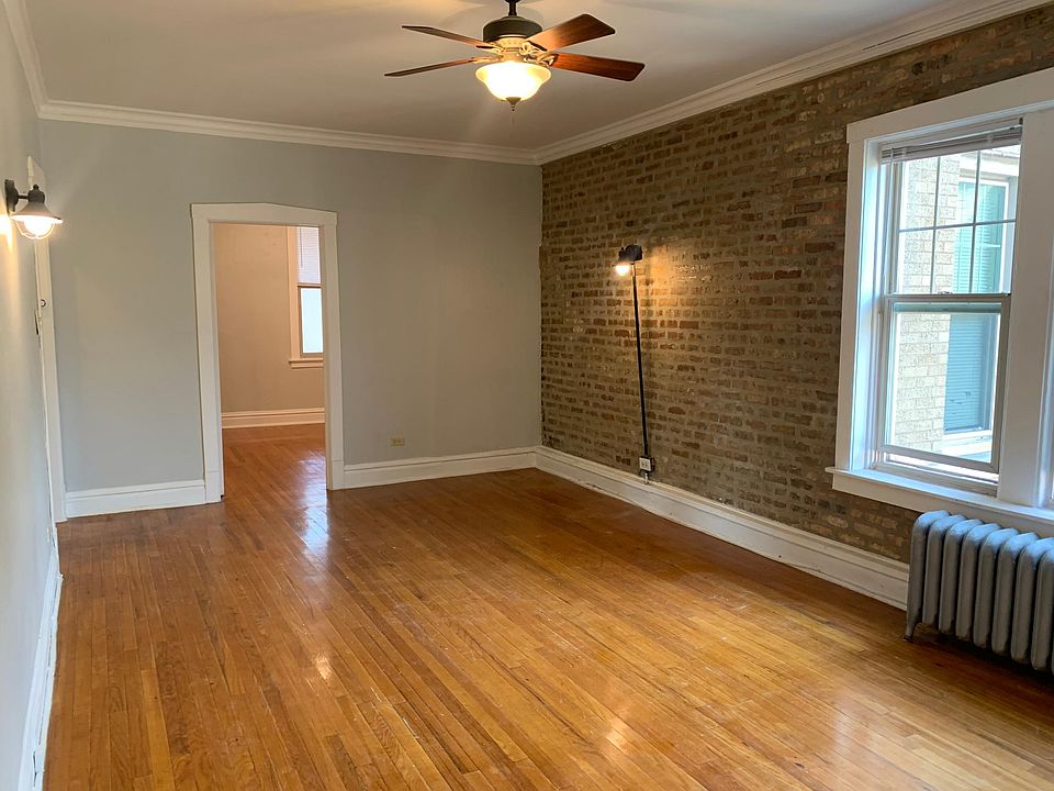 living room with exposed brick wall