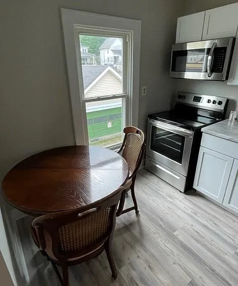 The Kitchen provides space for an eat in nook.