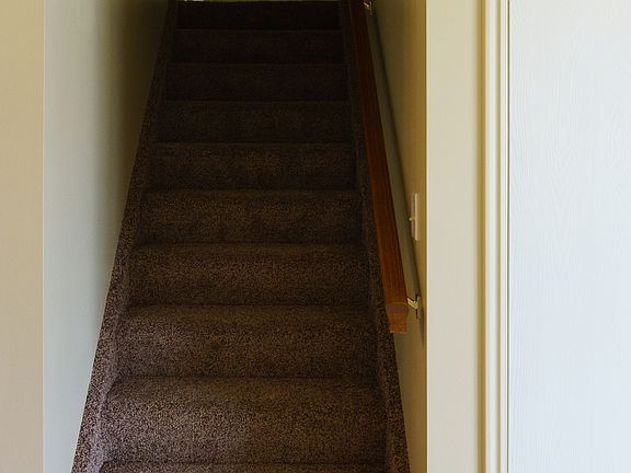 Stairs to upstairs (3 bedrooms/1 bath)