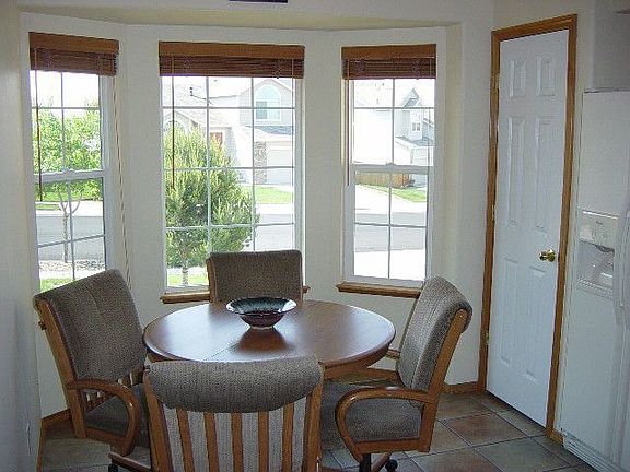 Eating nook in kitchen, plus kitchen pantry.