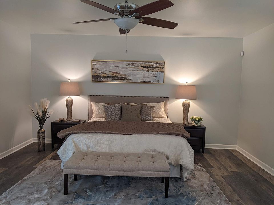 Huge master bedroom with ensuite bath and 2 walk-in closets. Access to out door space as well. Very high ceilings add to the great drama of the space.