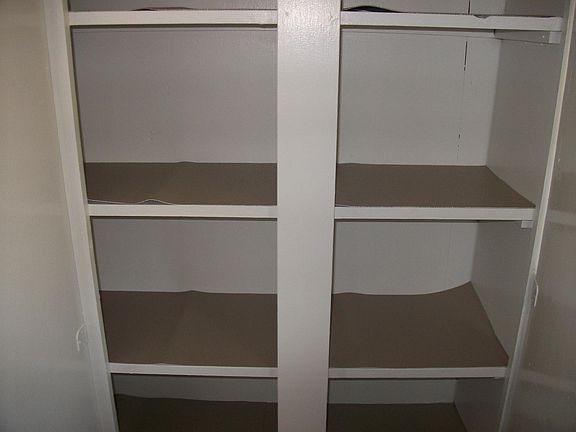 two kitchen storage cabinets