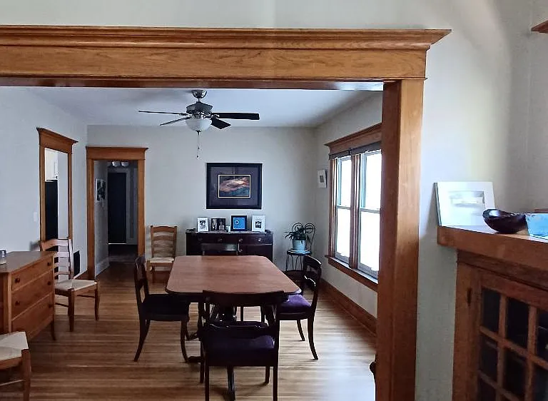 The dining room has a ceiling fan/light and a beautiful vintage dining set. The dining table expands to sit up to 10 people. Linens and napkins included.