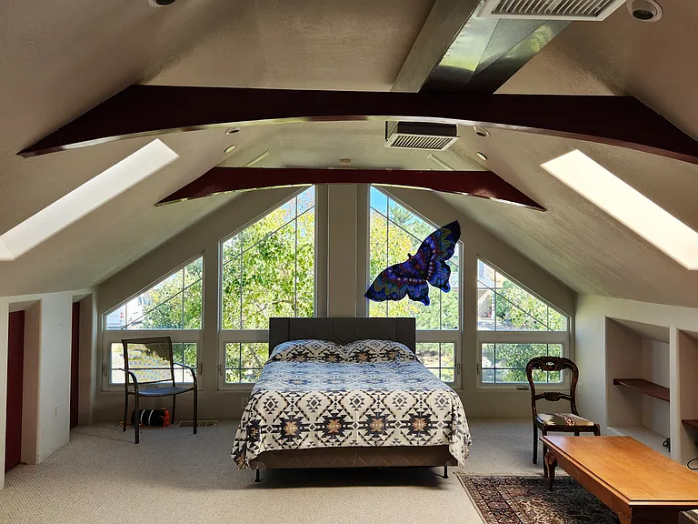 Loft bedroom from the spiral staircase.