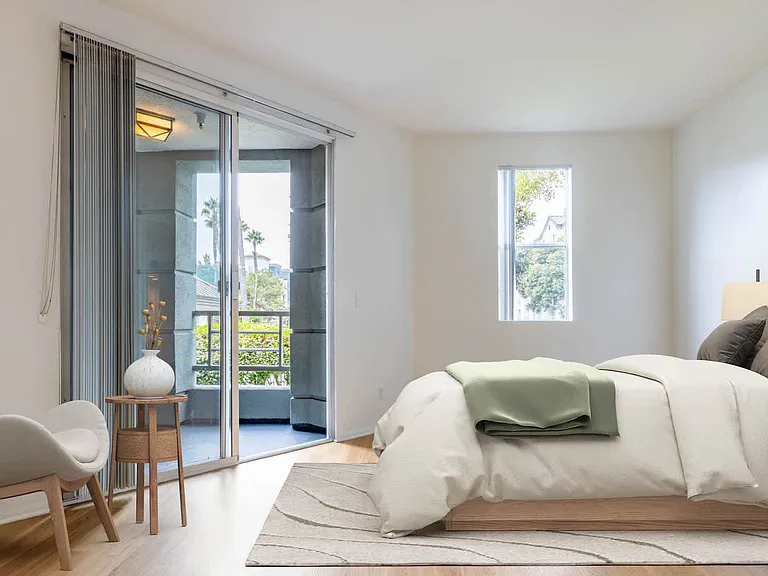Bedroom with Balcony and Hard Surface Flooring