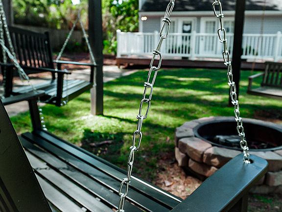 Spend a relaxing afternoon swinging gently by the community fire pit.