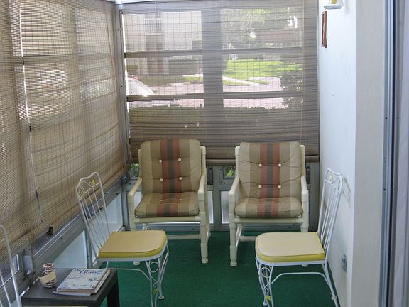 Enclosed Porch with Storage Area