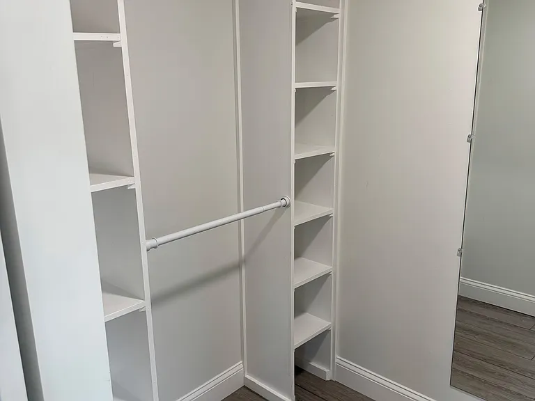 View of master bedroom closet left side.