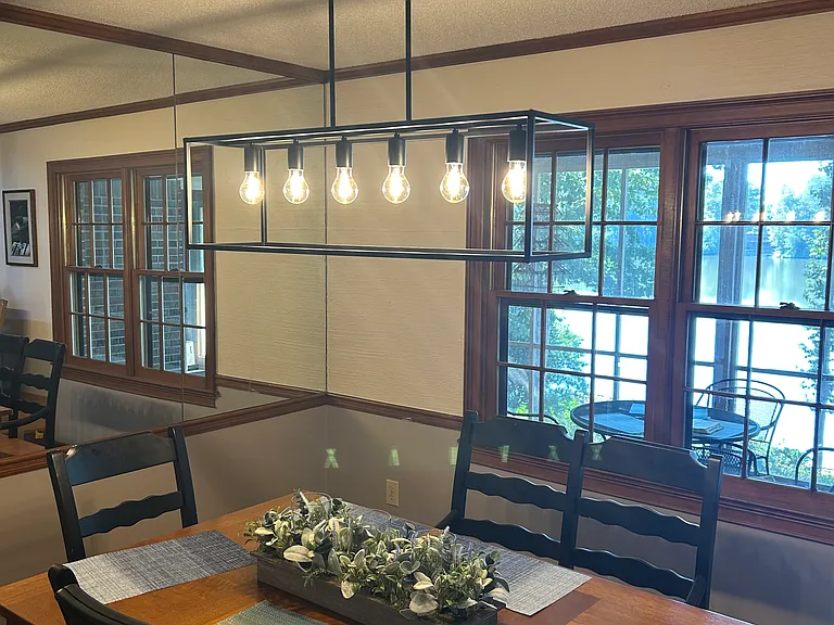New lighting Dining room looking out to the sunroom