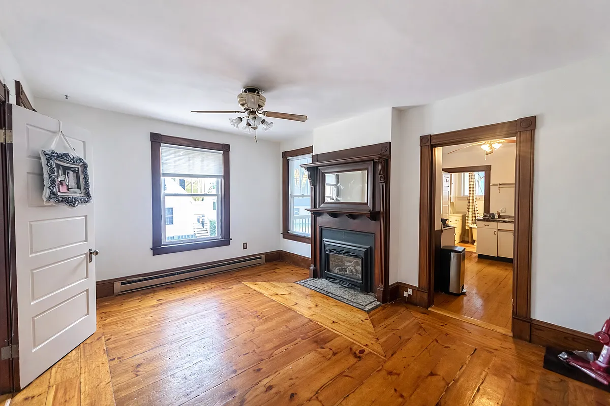 Living room with gas fireplace - 237 Water St #1L