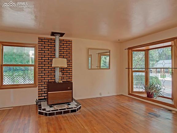 Gas heating stove and beautiful bay window in Living Room