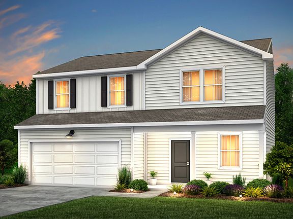 Osprey Exterior TD102 features siding, covered porch and 2 car garage