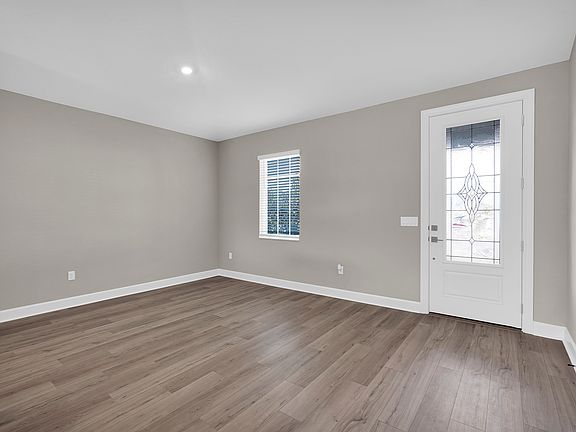 The dining room at the entryway creates an inviting space for meals and entertaining guests.