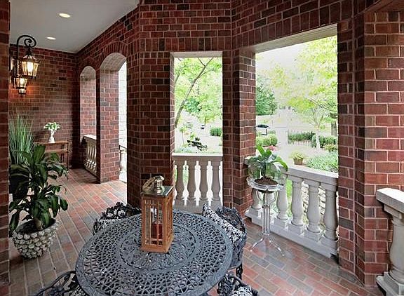 Front patio accessed through Living Room and Master Bedroom french doors.