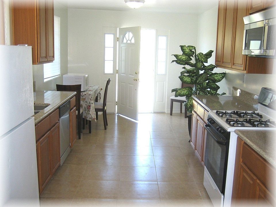 Like-new family kitchen with stainless appliances and sink