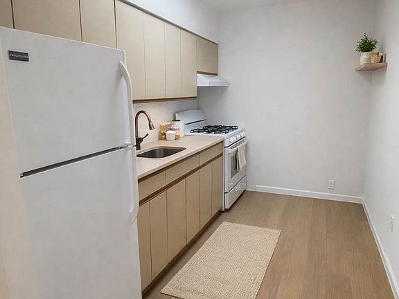 2nd image of 68-10 Woodside Ave #2