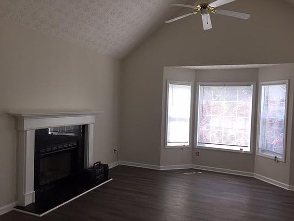 Vaulted Family Room with Gas Fire Place; all new flooring