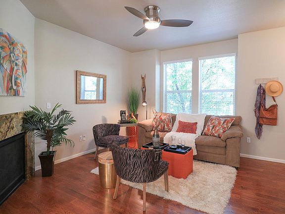 Family room with gas fireplace. Hardwood floors on first floor.