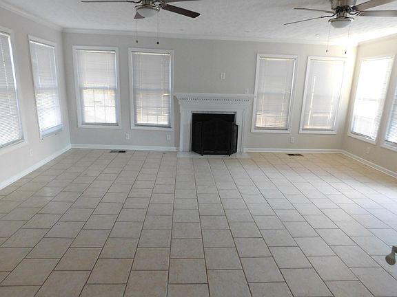 This is the second large area of the home where family can gather and create life-long memories! See how bright the room is even when the blinds are not open.